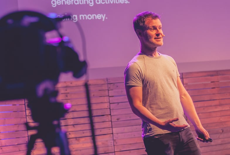 Dave Foy speaking on stage